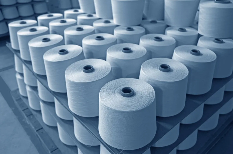 Polyester Yarns & other textile yarns in Surat by Devam Group